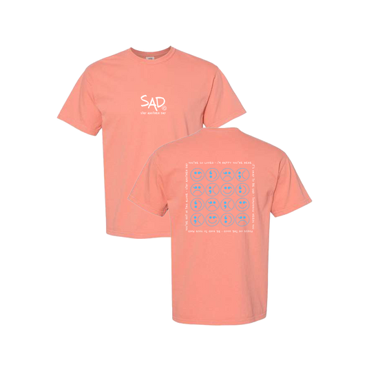 Multi Smiley Face Blue Screen Printed Coral T-shirt - Mental Health Awareness Clothing.